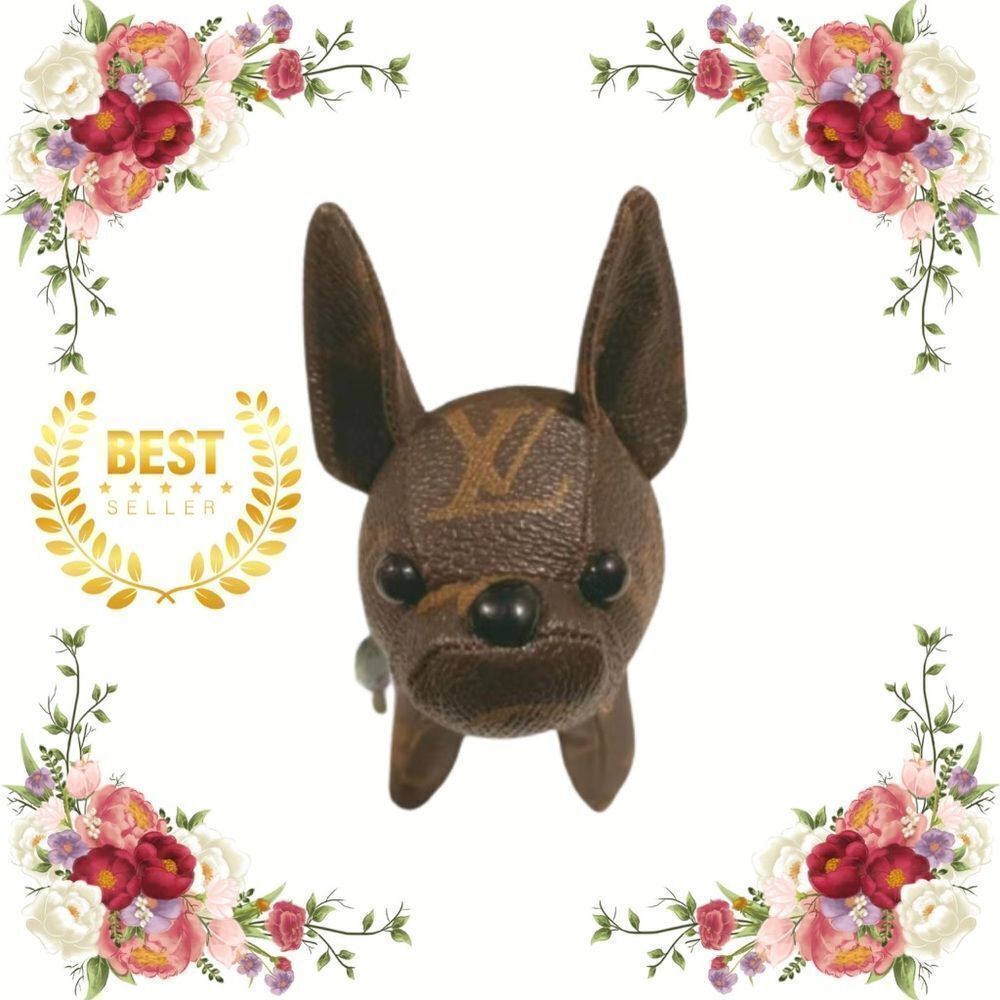 NEW LV Brown Bull Dog bag charm & keychain. NWOT
Comes with box - Picture 2 of 2